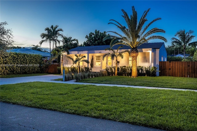 433 NE 91st St, Miami Shores, FL 33138 - view of front of home with stucco siding and driveway