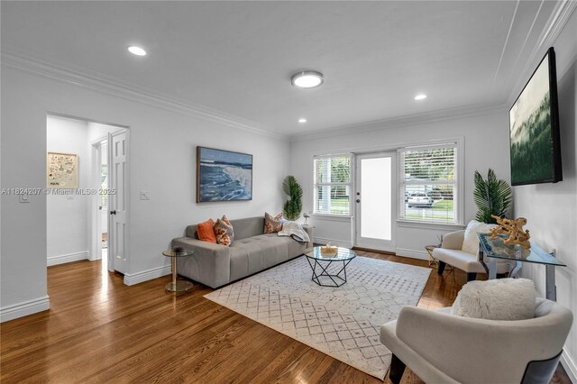 433 NE 91st St, Miami Shores, FL 33138 - living area with crown molding, wood finished floors, and recessed lighting