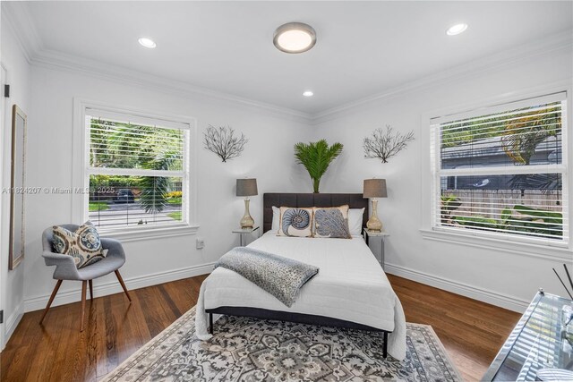433 NE 91st St, Miami Shores, FL 33138 - bedroom with wood finished floors, crown molding, and recessed lighting