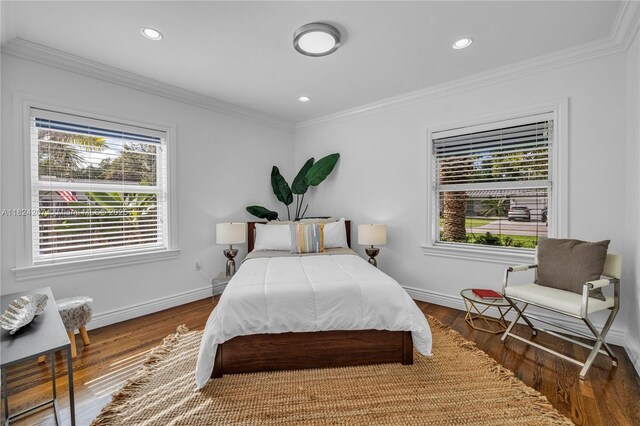 433 NE 91st St, Miami Shores, FL 33138 - bedroom featuring crown molding, wood finished floors, and recessed lighting