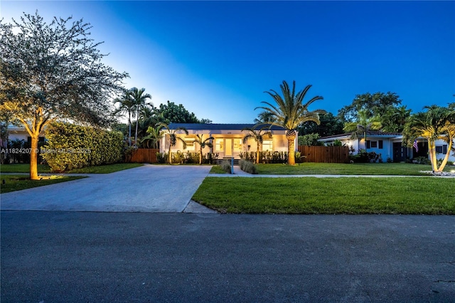 433 NE 91st St, Miami Shores, FL 33138 - view of front facade with concrete driveway and stucco siding