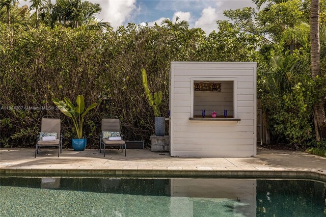 433 NE 91st St, Miami Shores, FL 33138 - swimming pool with a patio area