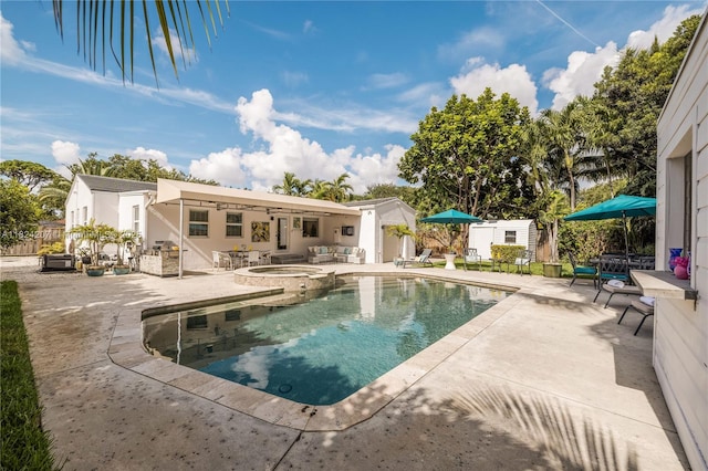 433 NE 91st St, Miami Shores, FL 33138 - view of pool with a patio area, a pool with connected hot tub, and a storage unit