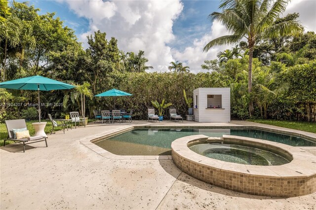 433 NE 91st St, Miami Shores, FL 33138 - view of pool featuring a patio and a pool with connected hot tub
