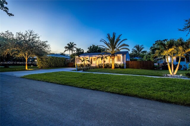 433 NE 91st St, Miami Shores, FL 33138 - view of front of property featuring driveway and stucco siding