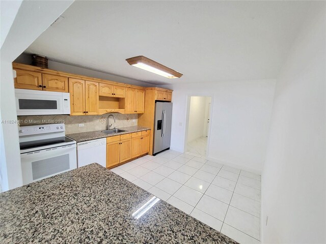 1800 SW 97th Ave, Miramar, FL 33025 - kitchen with white appliances, backsplash, light tile patterned floors, dark stone countertops, and open shelves
