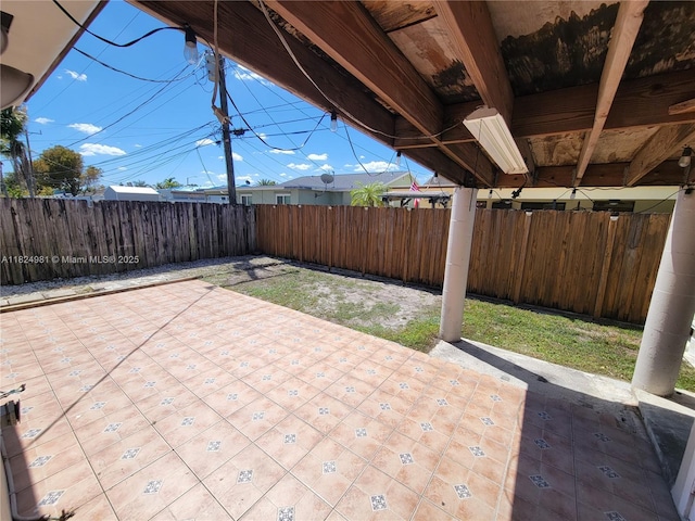 1800 SW 97th Ave, Miramar, FL 33025 - fenced backyard with a patio area