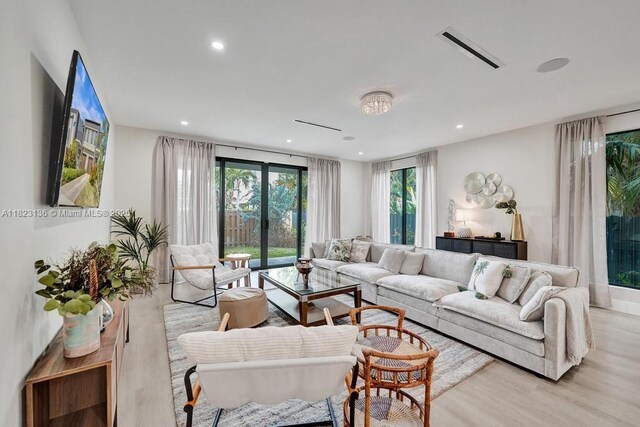 1101 NE 16th Ter Unit 1, Fort Lauderdale, FL 33304 - living area featuring wood finished floors and recessed lighting