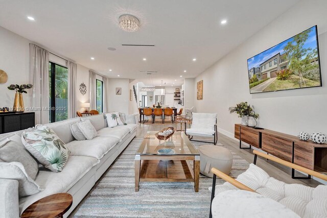 1101 NE 16th Ter Unit 1, Fort Lauderdale, FL 33304 - living room featuring recessed lighting and light wood-type flooring