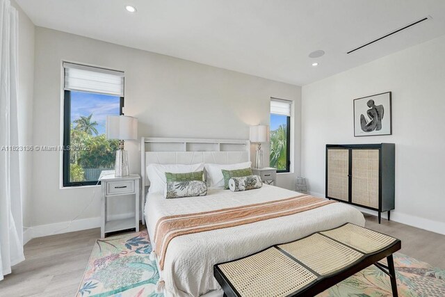 1101 NE 16th Ter Unit 1, Fort Lauderdale, FL 33304 - bedroom with wood finished floors and recessed lighting