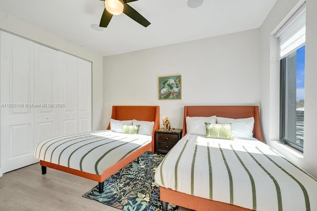 1101 NE 16th Ter Unit 1, Fort Lauderdale, FL 33304 - bedroom featuring wood finished floors, a closet, and a ceiling fan
