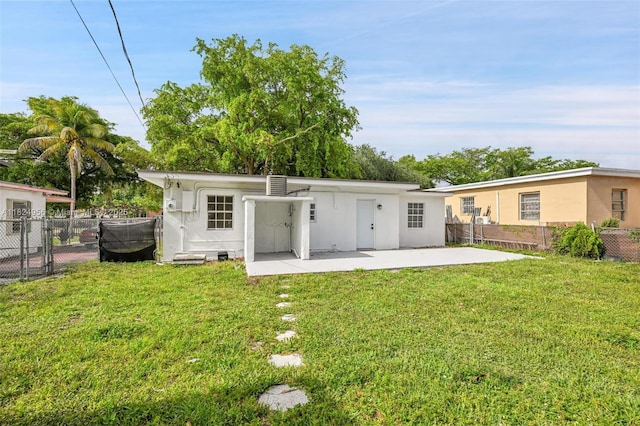 1355 NW 121st St, North Miami, FL 33167 - rear view of property with a patio area and stucco siding