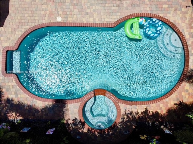 11360 NW 48th Ter, Doral, FL 33178 - drone / aerial view of a pool area
