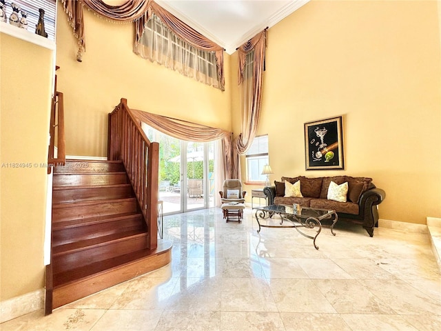 11360 NW 48th Ter, Doral, FL 33178 - stairs with crown molding, a high ceiling, and marble finish floors