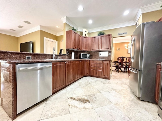 11360 NW 48th Ter, Doral, FL 33178 - kitchen with stainless steel appliances, ornamental molding, a peninsula, tasteful backsplash, and recessed lighting