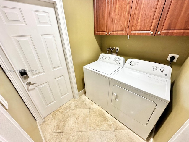 11360 NW 48th Ter, Doral, FL 33178 - laundry room with washing machine and dryer, cabinet space, and light tile patterned floors
