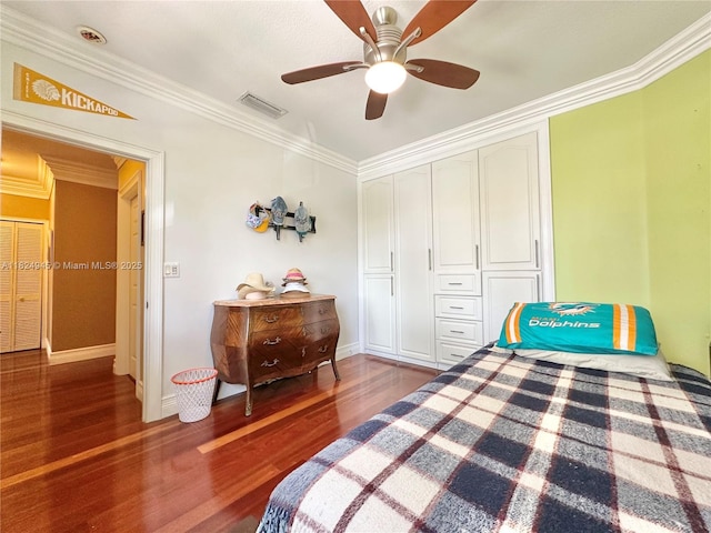 11360 NW 48th Ter, Doral, FL 33178 - bedroom featuring crown molding, wood finished floors, a closet, and a ceiling fan