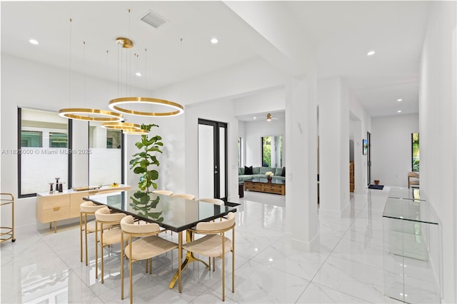 5840 E Brookfield Cir E, Hollywood, FL 33312 - dining area with recessed lighting and light marble finish flooring