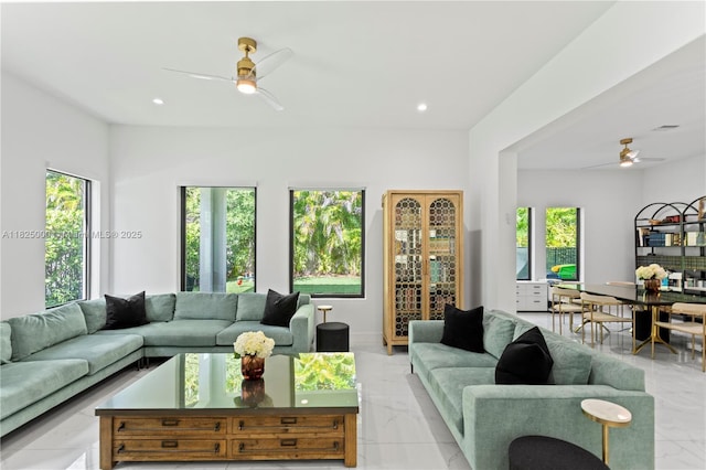 5840 E Brookfield Cir E, Hollywood, FL 33312 - living room featuring a ceiling fan, light marble finish floors, plenty of natural light, and recessed lighting