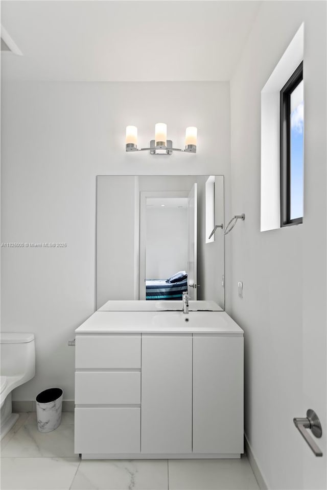 5840 E Brookfield Cir E, Hollywood, FL 33312 - bathroom featuring vanity and marble finish floors