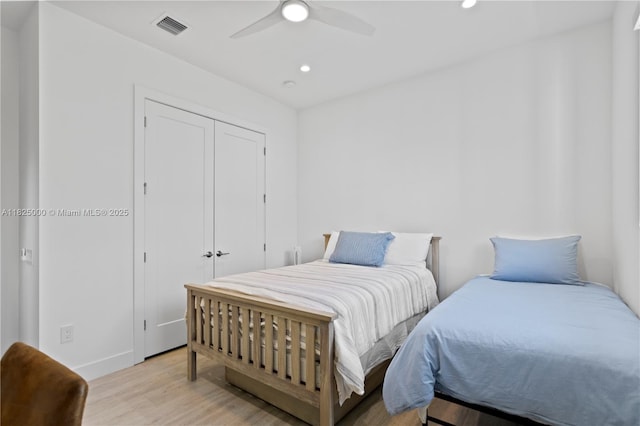 5840 E Brookfield Cir E, Hollywood, FL 33312 - bedroom with light wood-type flooring, recessed lighting, a closet, and a ceiling fan