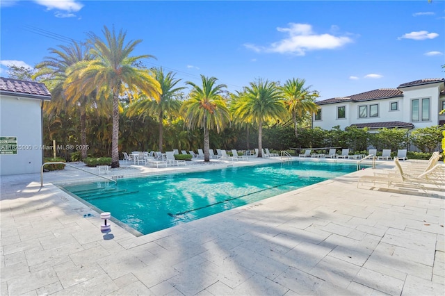 5840 E Brookfield Cir E, Hollywood, FL 33312 - community pool featuring a patio area