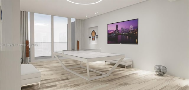700 NE 26th Ter Unit Ph-02, Miami, FL 33137 - dining space with wood finished floors, plenty of natural light, and floor to ceiling windows