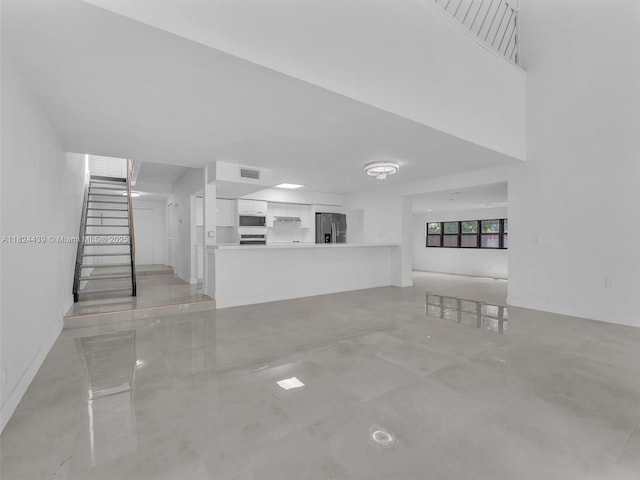 3427 Atlanta Dr, Hollywood, FL 33021 - unfurnished living room with stairway