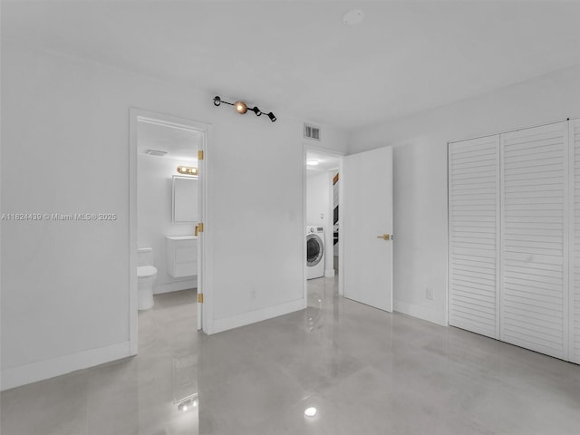 3427 Atlanta Dr, Hollywood, FL 33021 - unfurnished bedroom featuring washer / clothes dryer, a closet, and ensuite bathroom