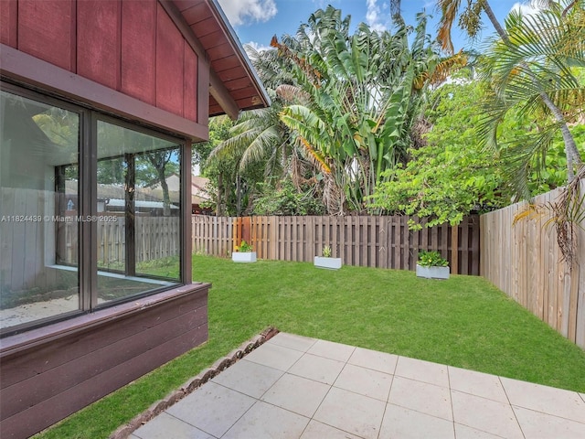 3427 Atlanta Dr, Hollywood, FL 33021 - fenced backyard with a patio