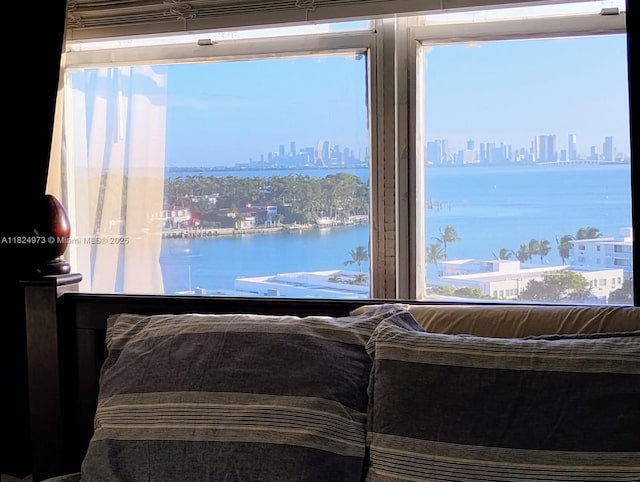 6900 Bay Dr Unit 11K, Miami Beach, FL 33141 - bedroom featuring a view of skyline and a water view
