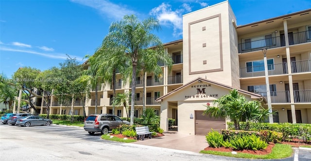 901 SW 141st Ave Unit 303M, Pembroke Pines, FL 33027 - view of apartment building / complex with uncovered parking