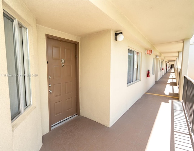 901 SW 141st Ave Unit 303M, Pembroke Pines, FL 33027 - doorway to property with stucco siding