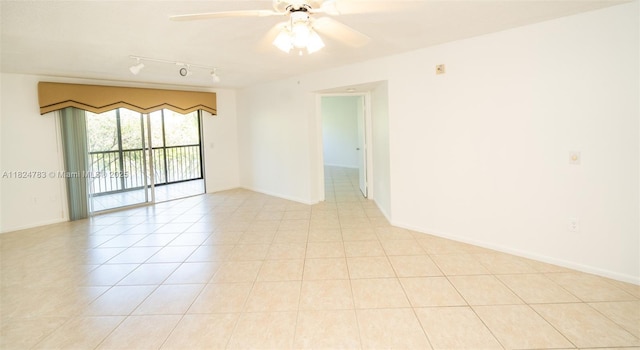901 SW 141st Ave Unit 303M, Pembroke Pines, FL 33027 - spare room with rail lighting, a ceiling fan, and light tile patterned floors
