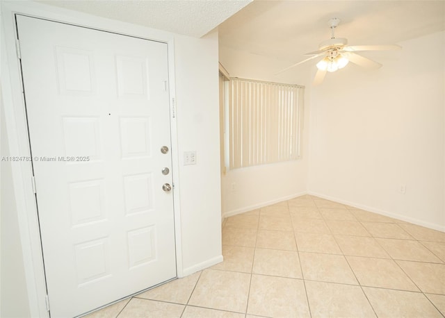 901 SW 141st Ave Unit 303M, Pembroke Pines, FL 33027 - entrance foyer with a ceiling fan and light tile patterned flooring