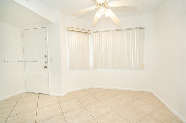 901 SW 141st Ave Unit 303M, Pembroke Pines, FL 33027 - spare room featuring tile patterned flooring and a ceiling fan