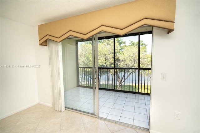 901 SW 141st Ave Unit 303M, Pembroke Pines, FL 33027 - tiled empty room with healthy amount of natural light