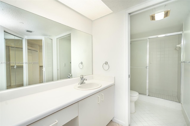 901 SW 141st Ave Unit 303M, Pembroke Pines, FL 33027 - full bathroom with a stall shower, vanity, and tile patterned floors