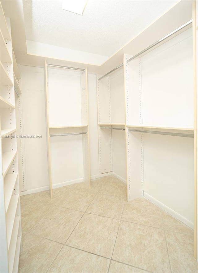 901 SW 141st Ave Unit 303M, Pembroke Pines, FL 33027 - spacious closet with light tile patterned flooring