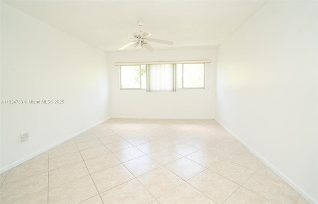 901 SW 141st Ave Unit 303M, Pembroke Pines, FL 33027 - spare room featuring ceiling fan and light tile patterned floors