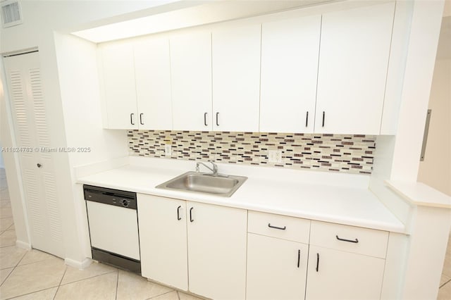 901 SW 141st Ave Unit 303M, Pembroke Pines, FL 33027 - kitchen with dishwasher, decorative backsplash, light countertops, and light tile patterned floors