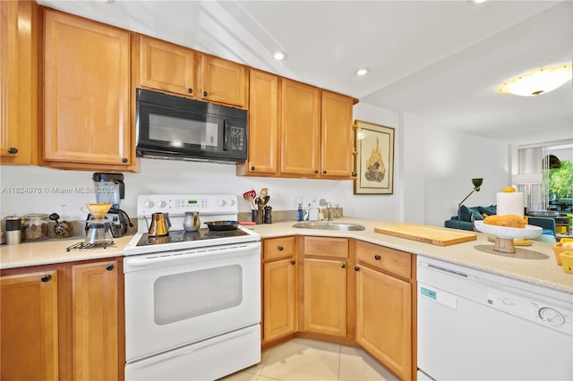 114 Royal Park Dr Unit 2B, Oakland Park, FL 33309 - kitchen with white appliances, light countertops, light tile patterned floors, and recessed lighting