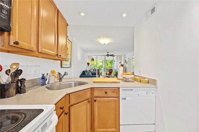 114 Royal Park Dr Unit 2B, Oakland Park, FL 33309 - kitchen featuring dishwasher, a peninsula, ceiling fan, brown cabinets, and recessed lighting