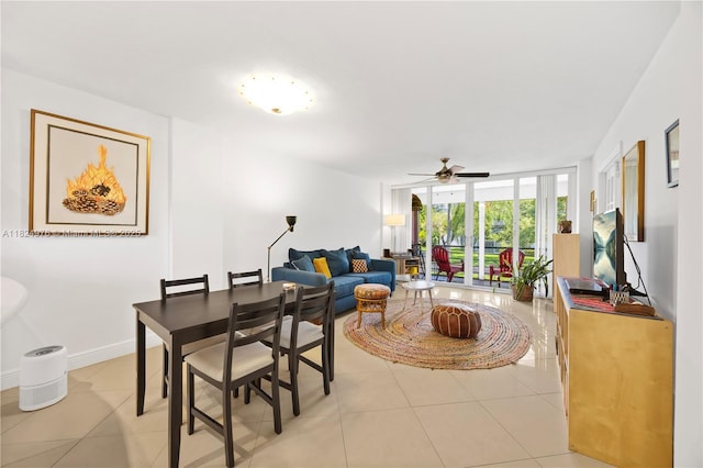 114 Royal Park Dr Unit 2B, Oakland Park, FL 33309 - living area with a ceiling fan, light tile patterned floors, and expansive windows