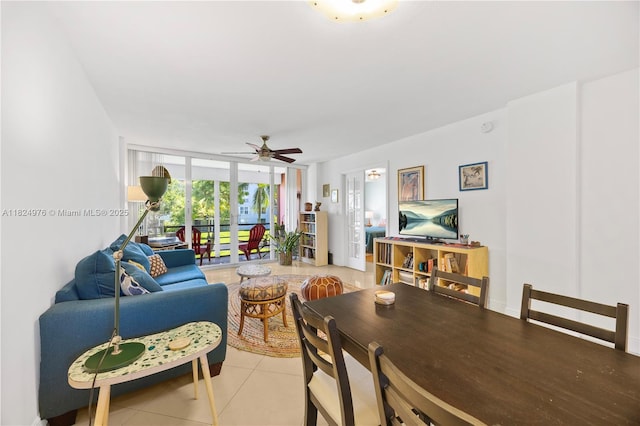 114 Royal Park Dr Unit 2B, Oakland Park, FL 33309 - living room featuring expansive windows, ceiling fan, and light tile patterned flooring