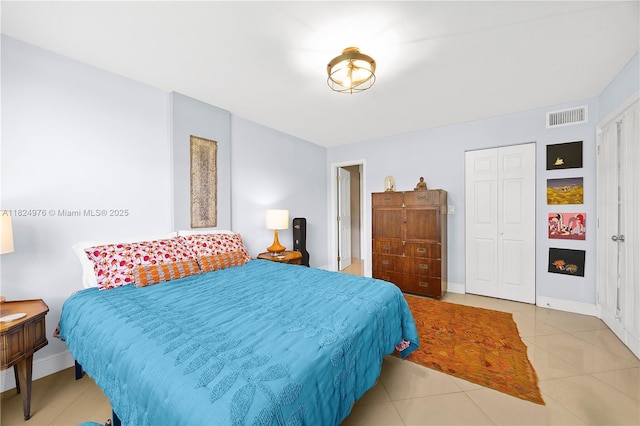 114 Royal Park Dr Unit 2B, Oakland Park, FL 33309 - bedroom with tile patterned flooring and a closet