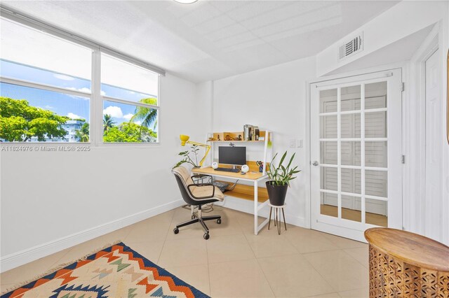 114 Royal Park Dr Unit 2B, Oakland Park, FL 33309 - tiled office featuring baseboards