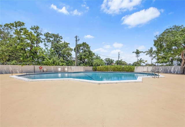 114 Royal Park Dr Unit 2B, Oakland Park, FL 33309 - community pool featuring a patio