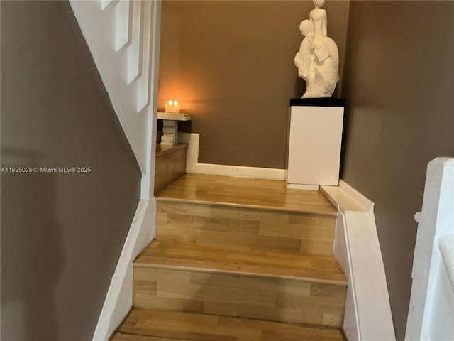 4925 W Lakes Dr, Deerfield Beach, FL 33442 - staircase featuring wood finished floors