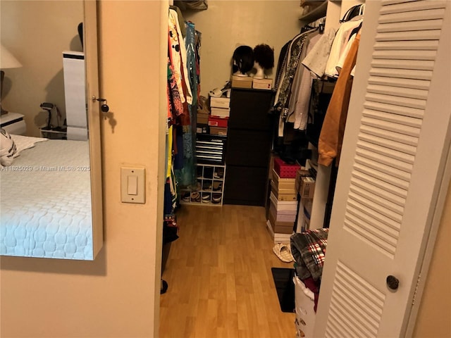 4925 W Lakes Dr, Deerfield Beach, FL 33442 - walk in closet with wood finished floors